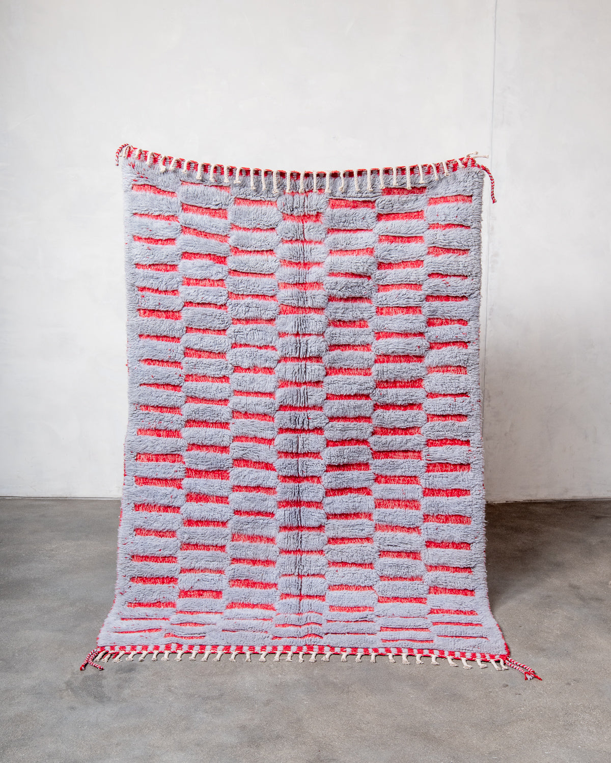 Modern, designer, handcrafted Berber rug from Morocco. Beniourain carpet with beautiful colours and patterns and fluffy wool texture.